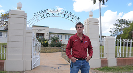 Mayor Frank Beveridge in front of Charters Towers Hospital